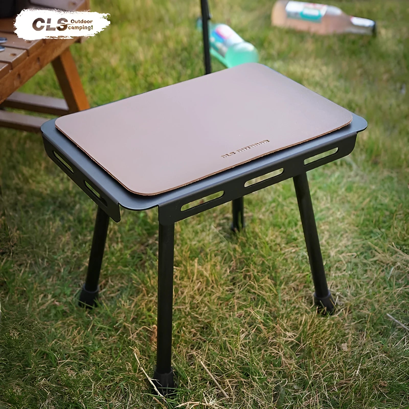 CLS aluminium dual-use folding camping stool converted into a small table next to its storage bag.