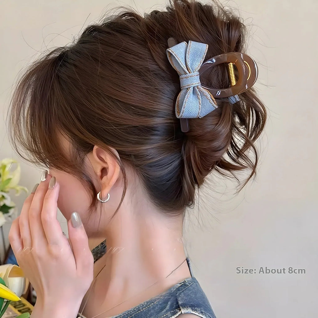 Blue denim bow barrette with cloth bow and metal clip on women back head hair
