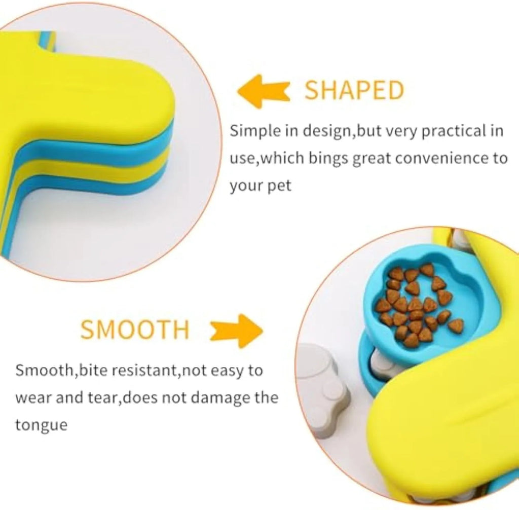 Yellow three-layer rotating dog puzzle feeder toy with anti-slip rubber base on a floor.