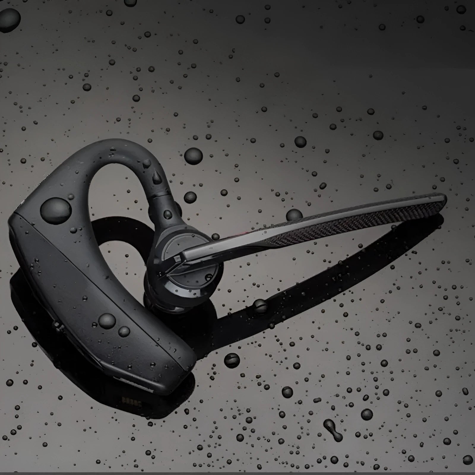 Black plastic Bluetooth sports headphones with a USB port and a battery display.