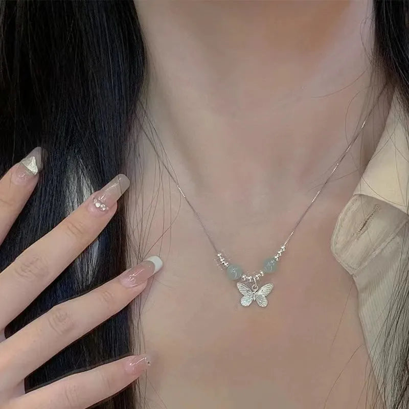 Hetian jade silver butterfly bracelet and necklace set with electroplated copper construction