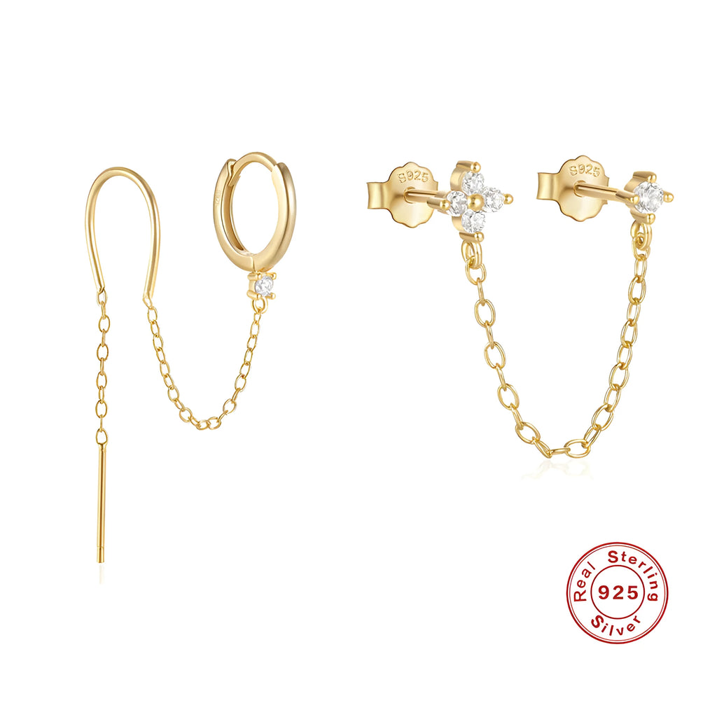 Close-up of a geometric S925 sterling silver clip-on earring featuring a diamond flower and a delicate gold-plated chain tassel.
