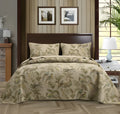 Blue American floral and bird pattern quilted cotton bedspread set on a bed, showing detailed stitching and 230x250cm size.