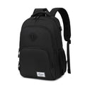 Simple grey and black nylon backpack with USB charging port on side strap.