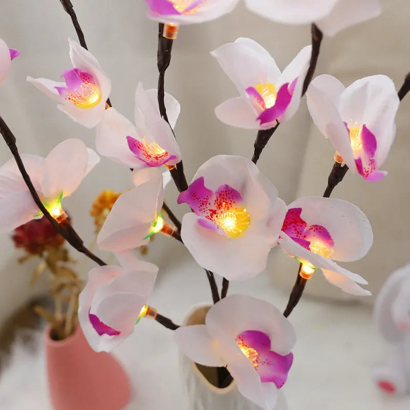 Pink phalaenopsis orchid branch LED light with fabric shade on a wooden surface, measuring 65cm long.