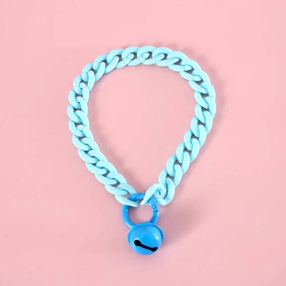 Soft plastic pet collar in pastel macaron candy colours with a chain-link design, shown in S and M sizes.