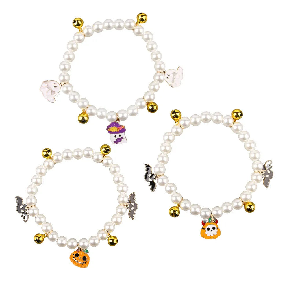 Halloween cat collar decorated with simulated pearls in a pumpkin design on a pet