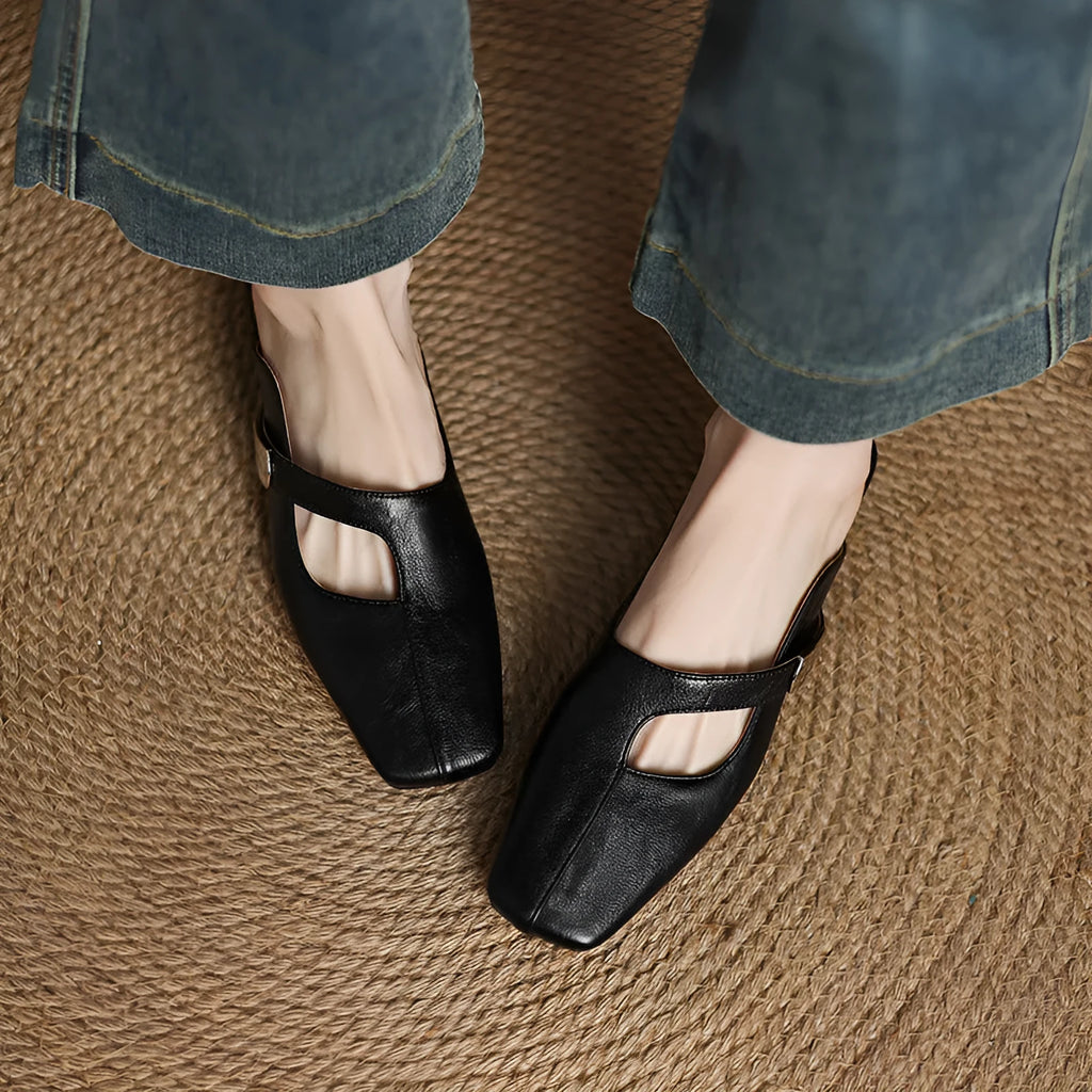 British style square toe outdoor slippers in beige with a low heel and rubber sole.