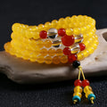 108-bead agate necklace with crystal lucky cat charm and geometric polished beads