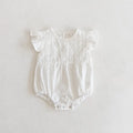 Creamy white cotton lace triangle jumpsuit for baby girl with short sleeves and button closure
