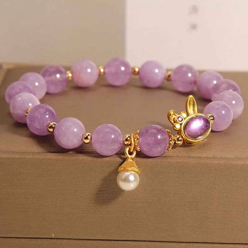 Mauve jade rabbit bracelet with crystal hare head design on adjustable wristband