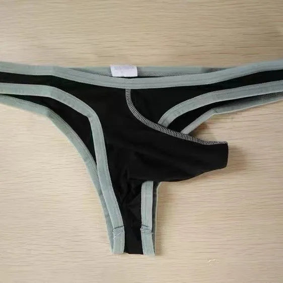 Men's white Ice Silk nylon briefs on a grey background, showing the elephant nose front pouch design.
