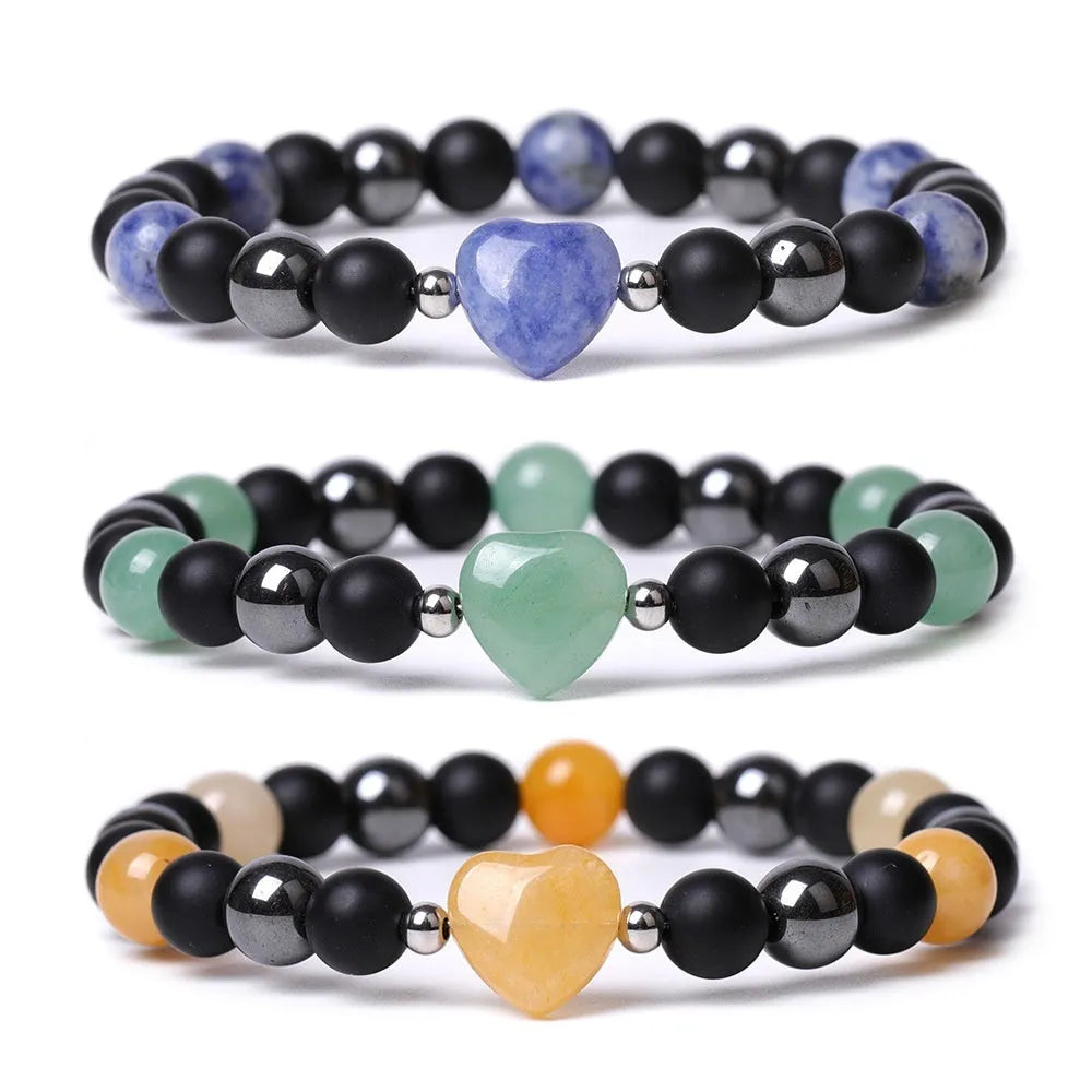 Lvdongling stone bracelet with hand-cut peach heart charm and planetary charms in tigereye colour