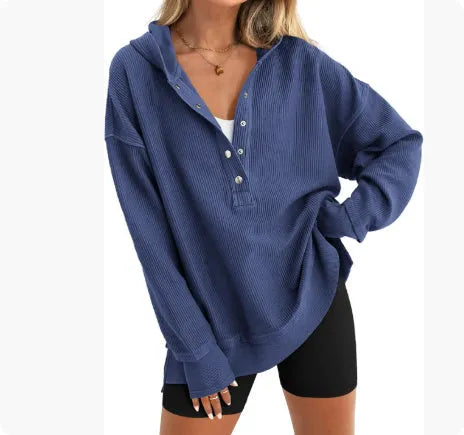 Women's solid colour loose-fit pullover sweater with raglan sleeves in peacock green.