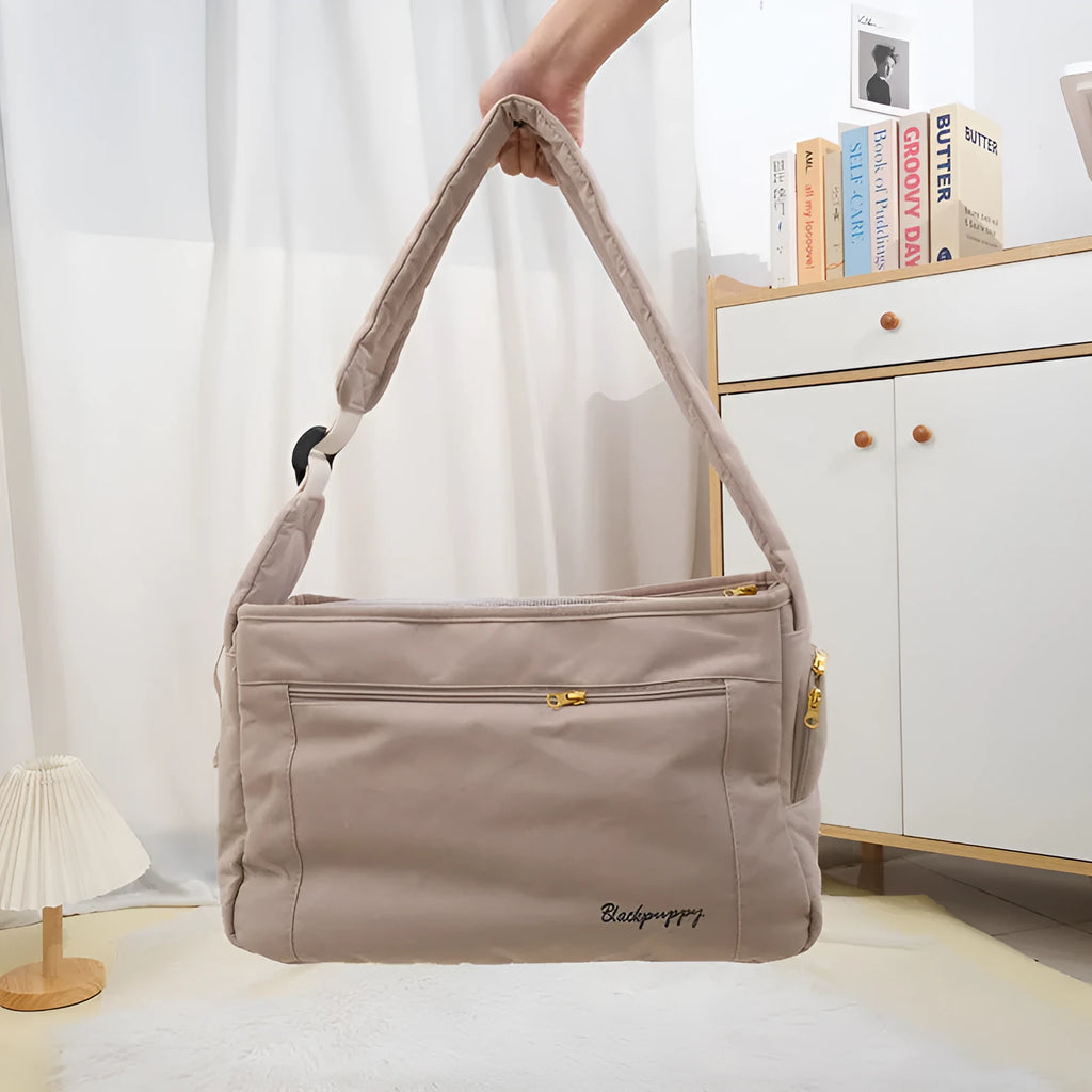 Soft surface large capacity pet messenger bag in black and beige with shoulder strap