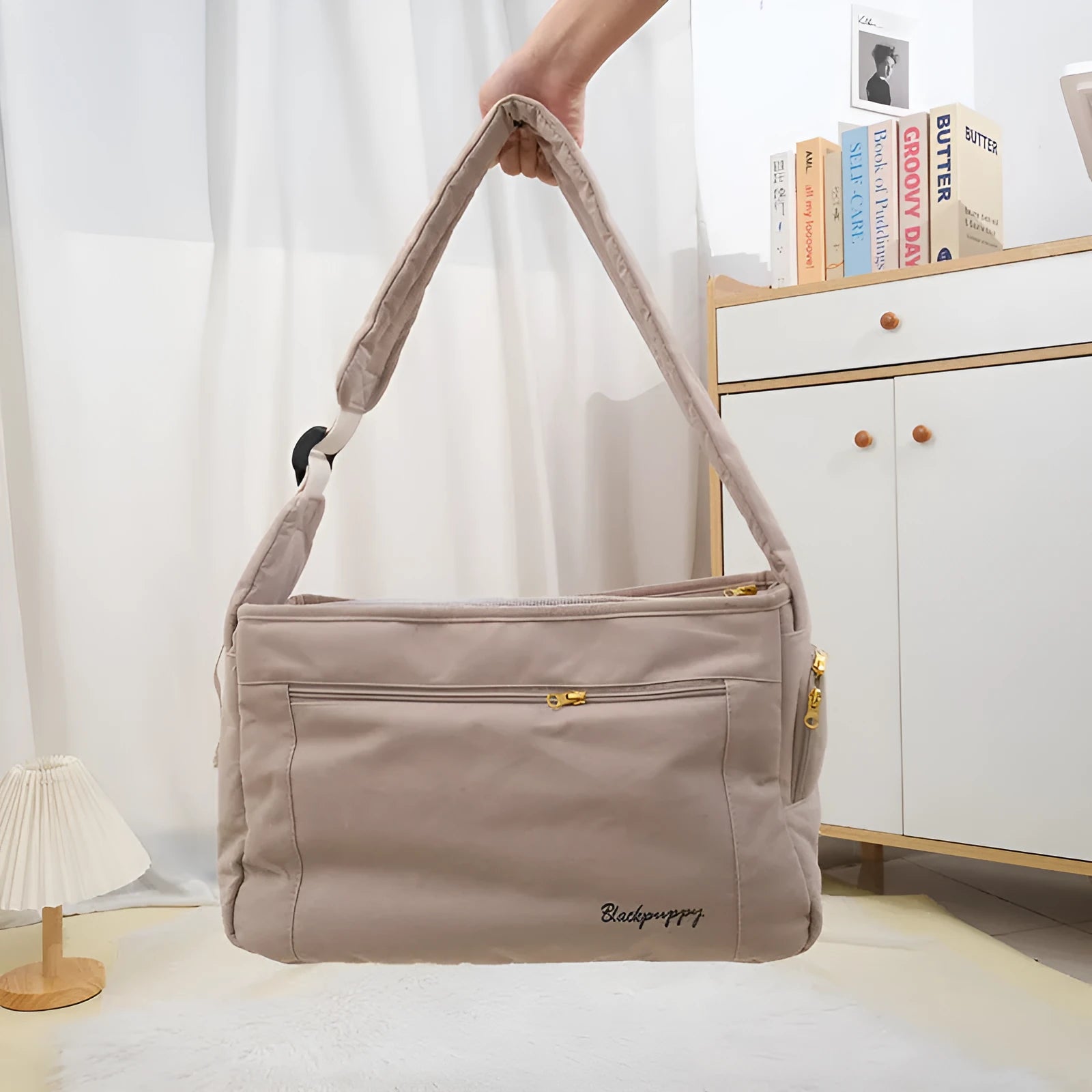 Soft surface large capacity pet messenger bag in black and beige with shoulder strap