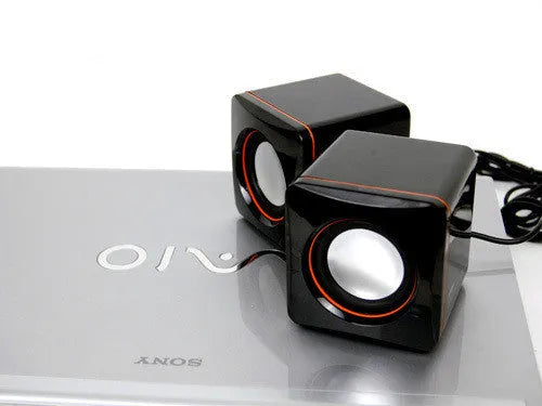 Black square USB-powered 2.0 mini desktop speaker for computer and laptop audio.