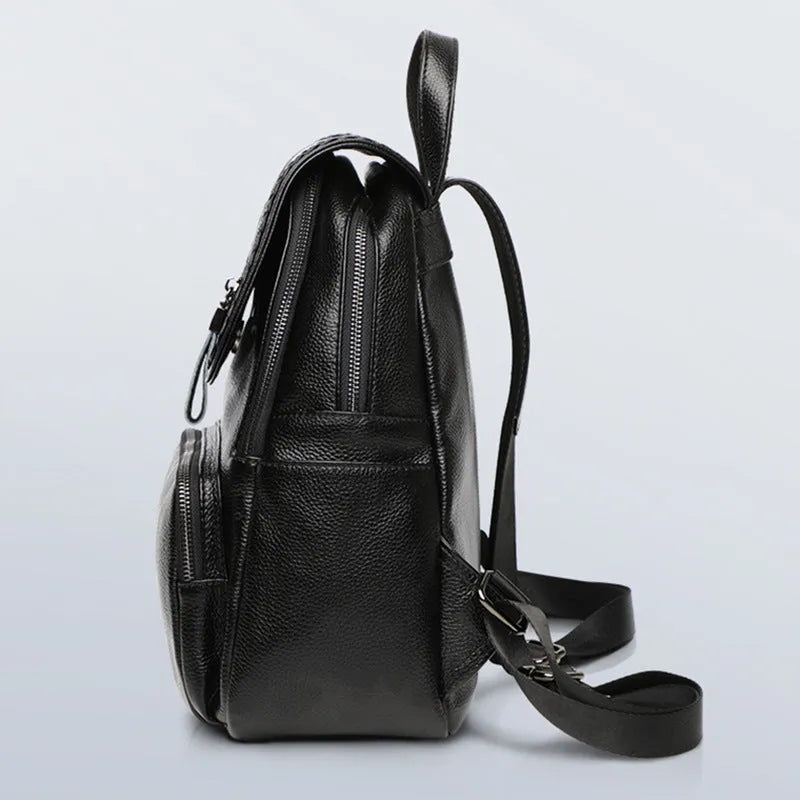 Blue genuine leather women's backpack with outer pocket and internal organiser compartments