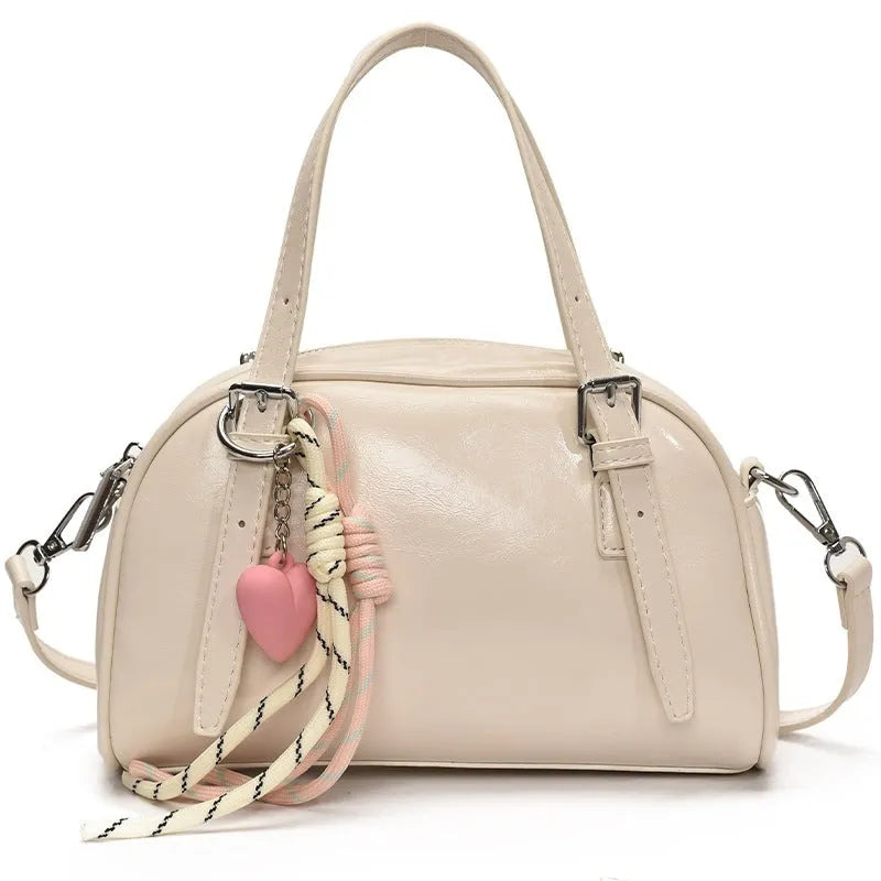 Korean style square shell shoulder bag for women in PU leather with colour and strap options