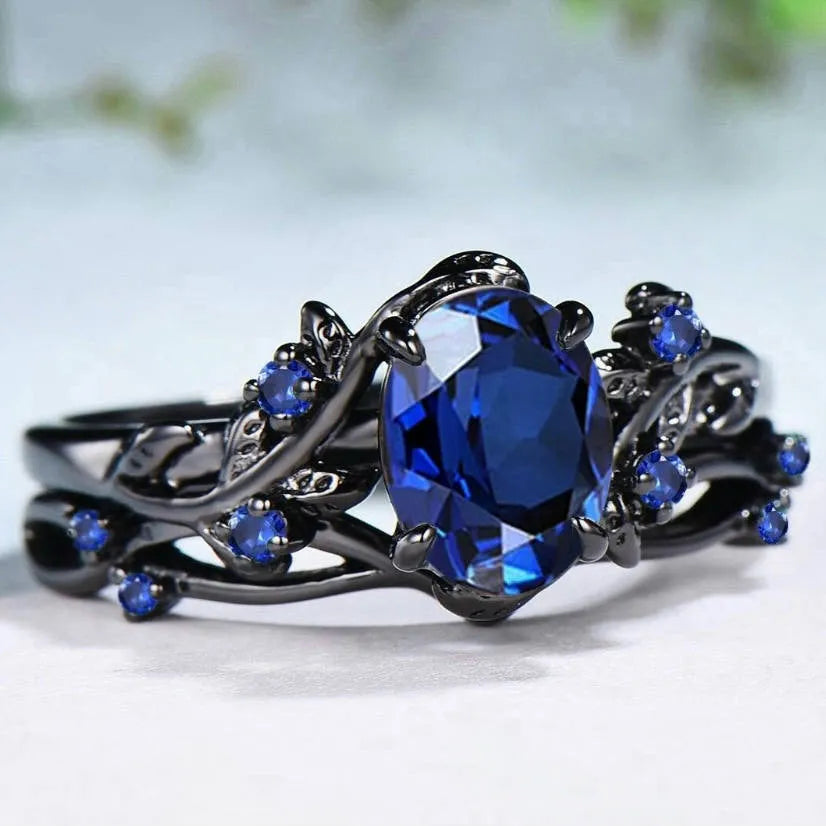 Gun black women's couple ring with navy blue rhinestone inlay on geometric copper band