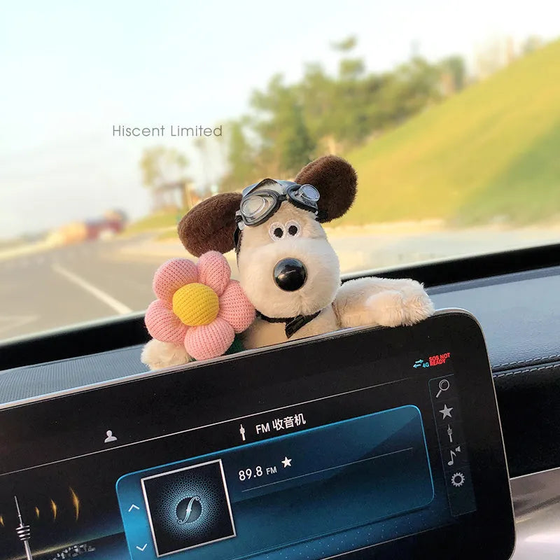 Cute cotton car decoration doll showing a pilot dog design on a dashboard.