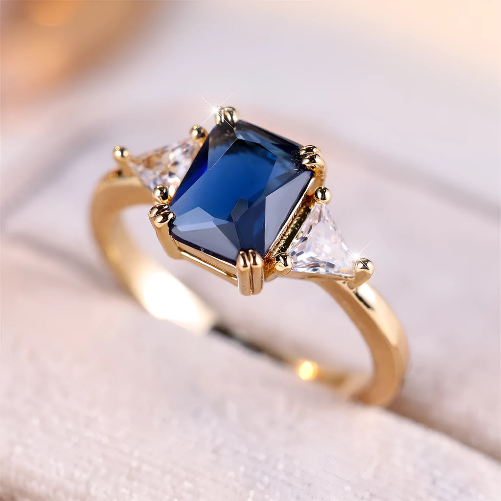 Rectangular gold sapphire blue copper ring for women showing geometric design