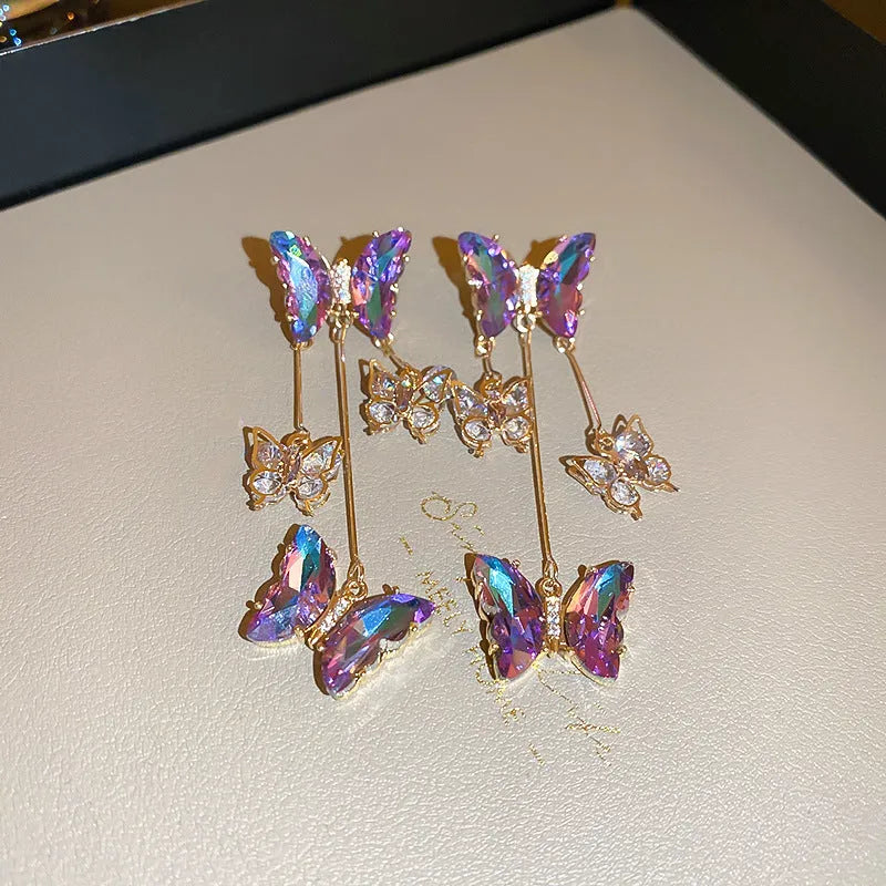 Silver Needle blue purple butterfly tassel earrings with crystal flowers on a 4.5cm alloy drop.