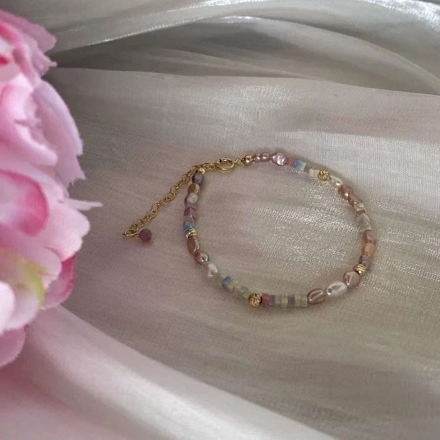 Women's natural pearl bracelet and necklace set with silver pearls and gilded purple 14K plating.