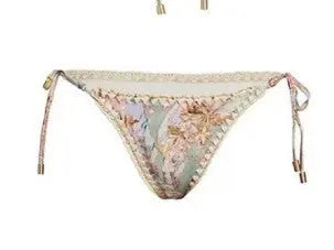 Women's creamy-white floral bikini set with matching skirt for beach holidays