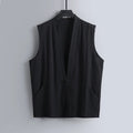 Men's grey linen sleeveless vest with a loose fit, shown on a hanger.