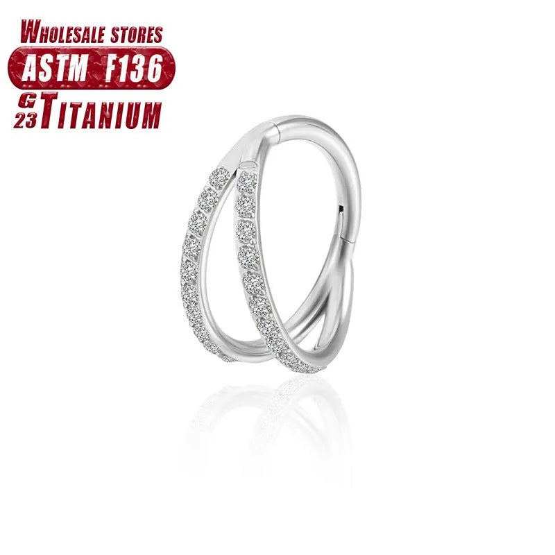 Titanium alloy nose ring or septum piercing in silver, available in multiple lengths and diamond-accented styles.