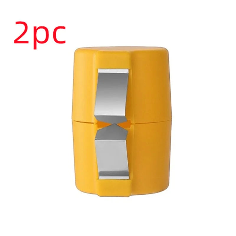 Colourful egg shell opener and beater kitchen tool made of stainless steel and plastic on a kitchen counter.