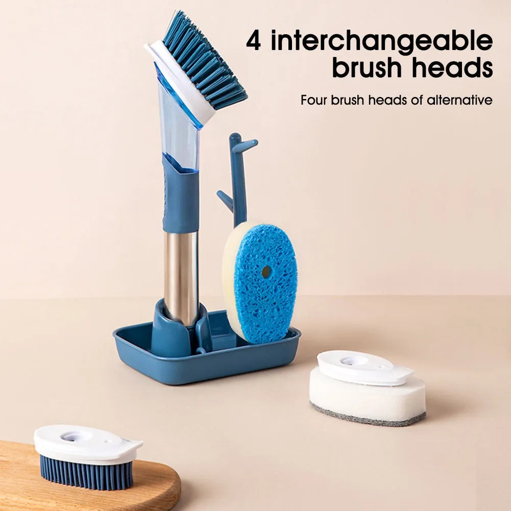Blue long-handled kitchen dish brush with built-in soap dispenser button, sponge, and scouring block.