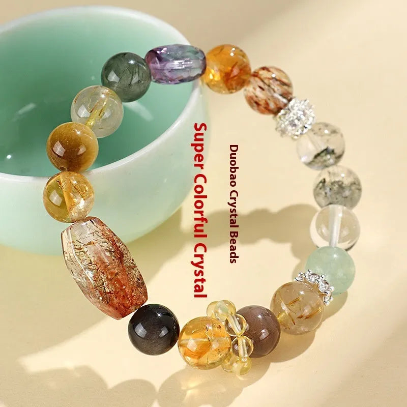 Adjustable black and gold crystal bead bracelet with natural multi-coloured stones on gold-finished settings
