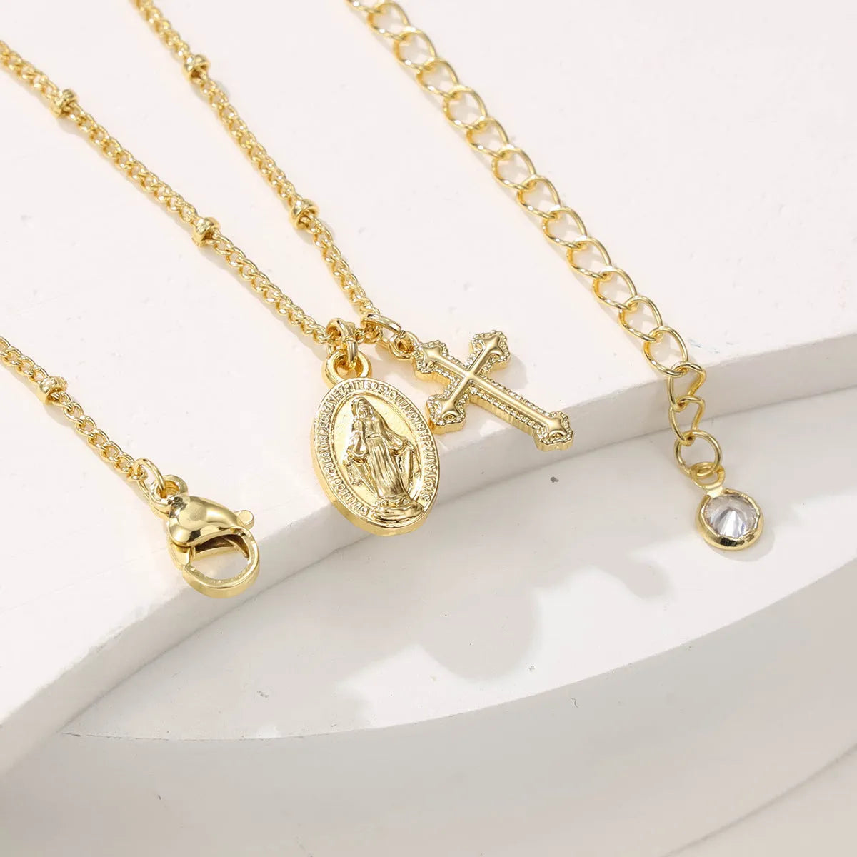 Gold geometric cross Virgin Mary necklace for women on copper chain