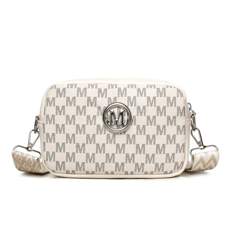 Soft PU crossbody shoulder bag in black with a wide strap and a three-dimensional front pocket.