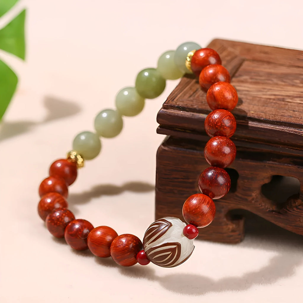 Red rosewood and grey jade women's bracelet with a geometric Bodhi lotus bead in Chinese style.