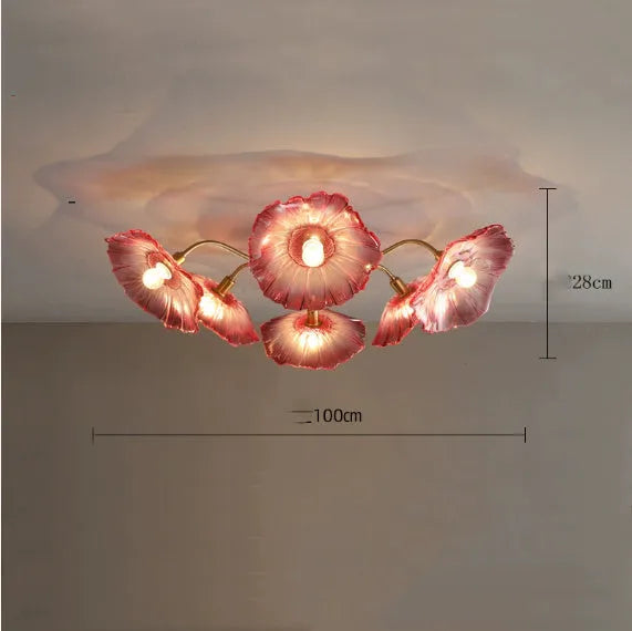 Modern creative ceiling chandelier with five white flower heads and warm lighting.