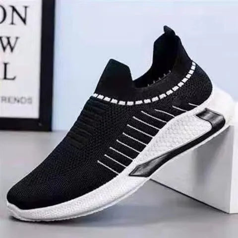 Men's black and white striped mesh slip-on sneakers with flyknit upper and lace-up front
