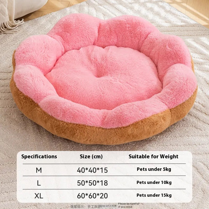 Round plush cat bed with detachable inner nest in grey and black, showing raised sides and soft texture.