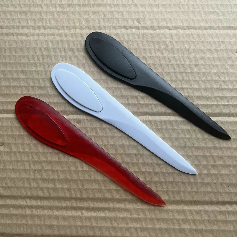 Willow Leaf Art A4 plastic paper cutter with colourful handle on white background