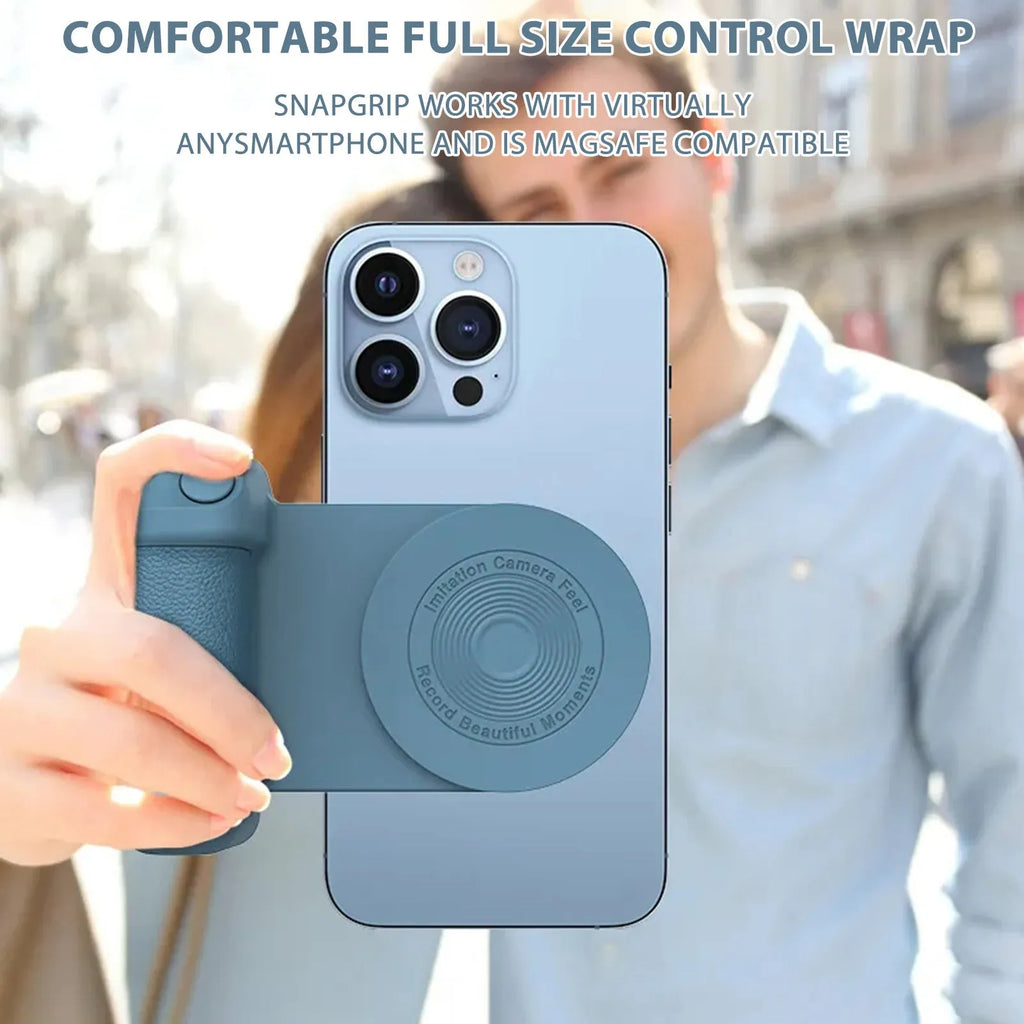 Black multifunctional phone camera holder with magnetic suction and rotatable stand on a table.