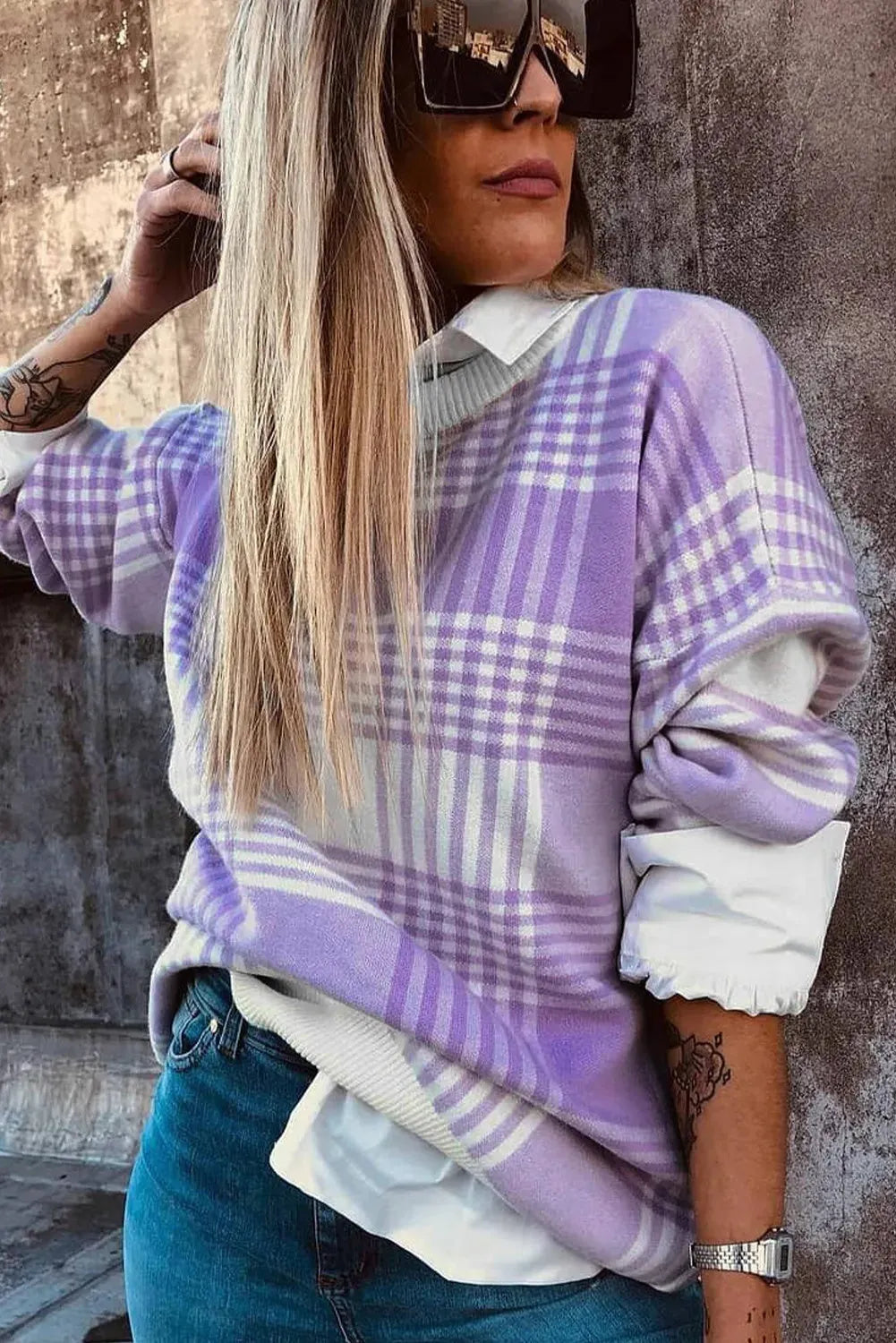 Lilac plaid print loose sweater with ribbed trim on the cuffs and a relaxed fit.