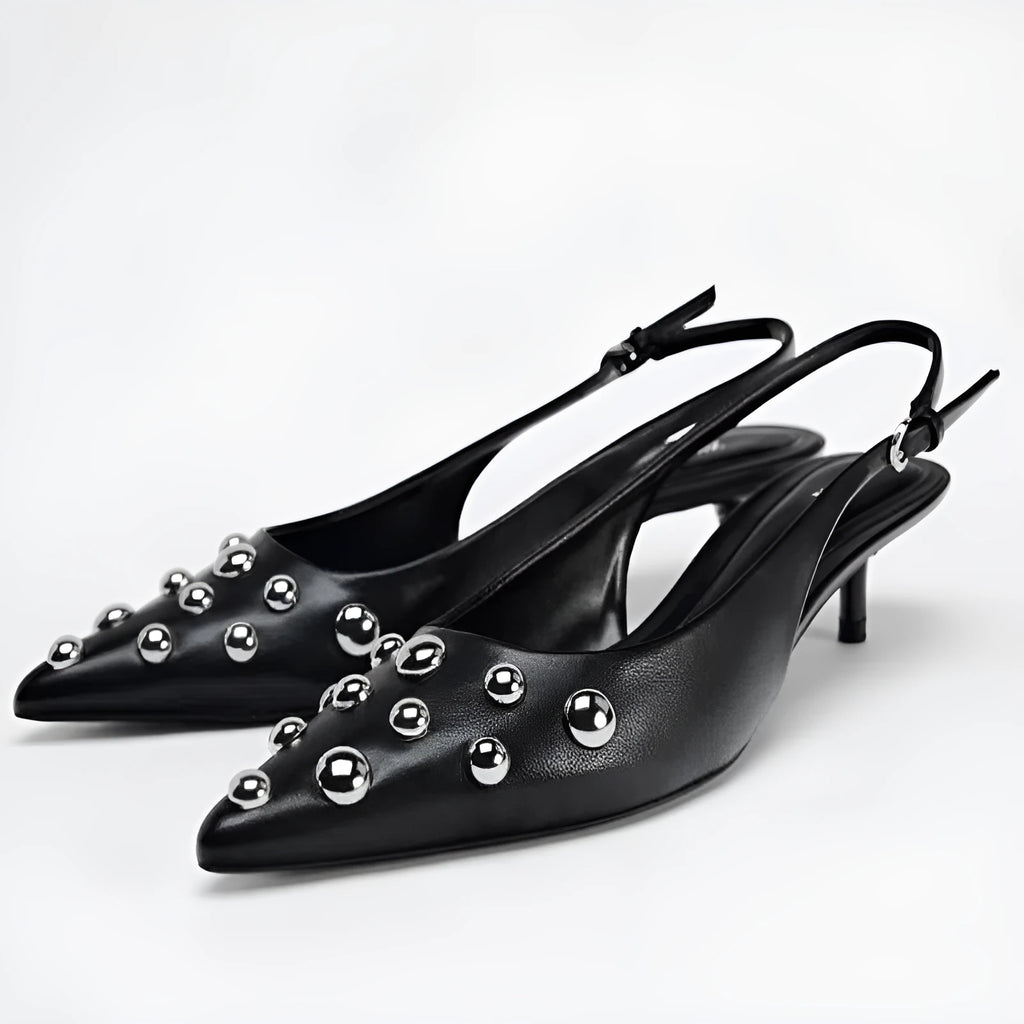 Women's black pointed stiletto wedge heel shoes with rivet decorations and synthetic PU upper