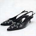 Women's black pointed stiletto wedge heel shoes with rivet decorations and synthetic PU upper