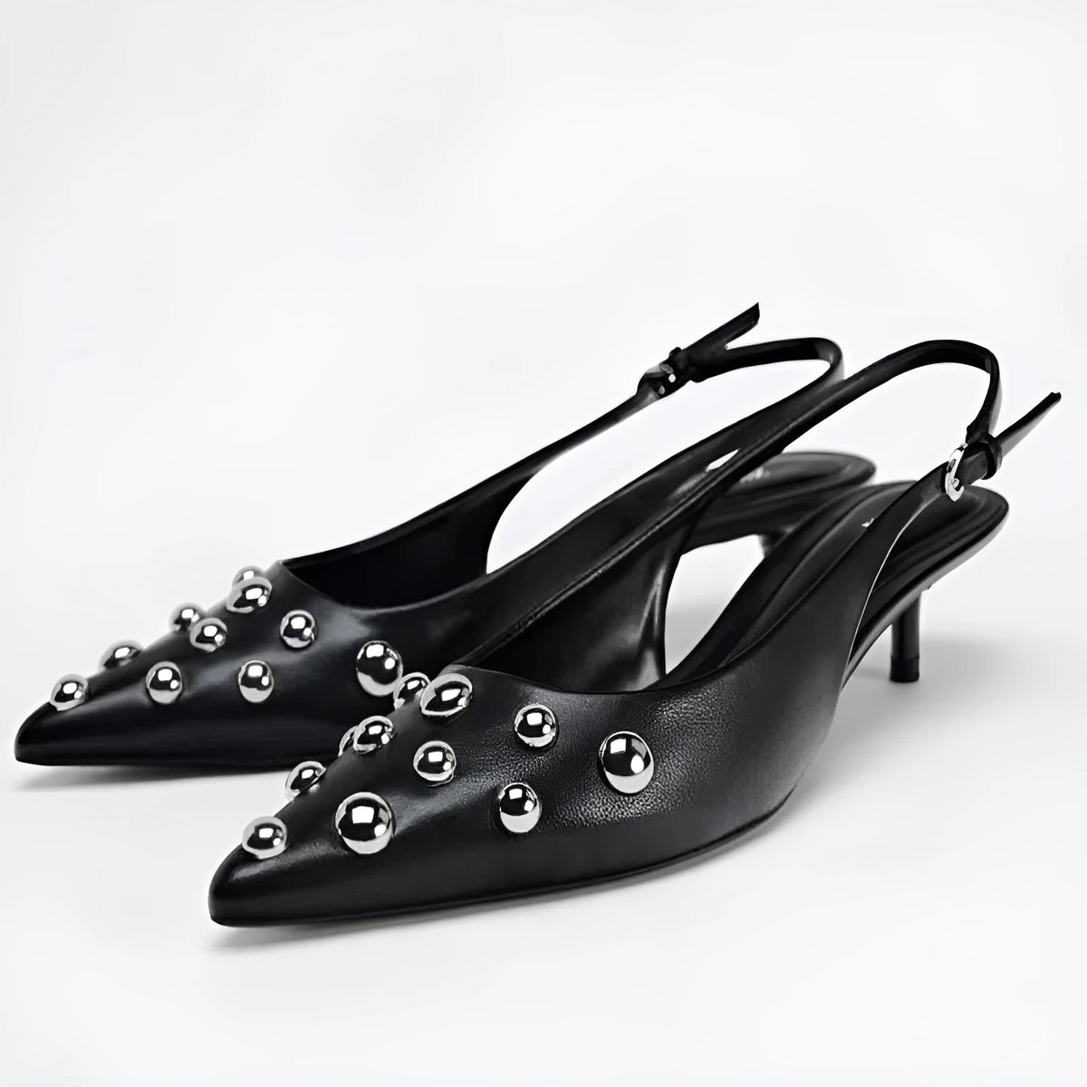 Women's black pointed stiletto wedge heel shoes with rivet decorations and synthetic PU upper