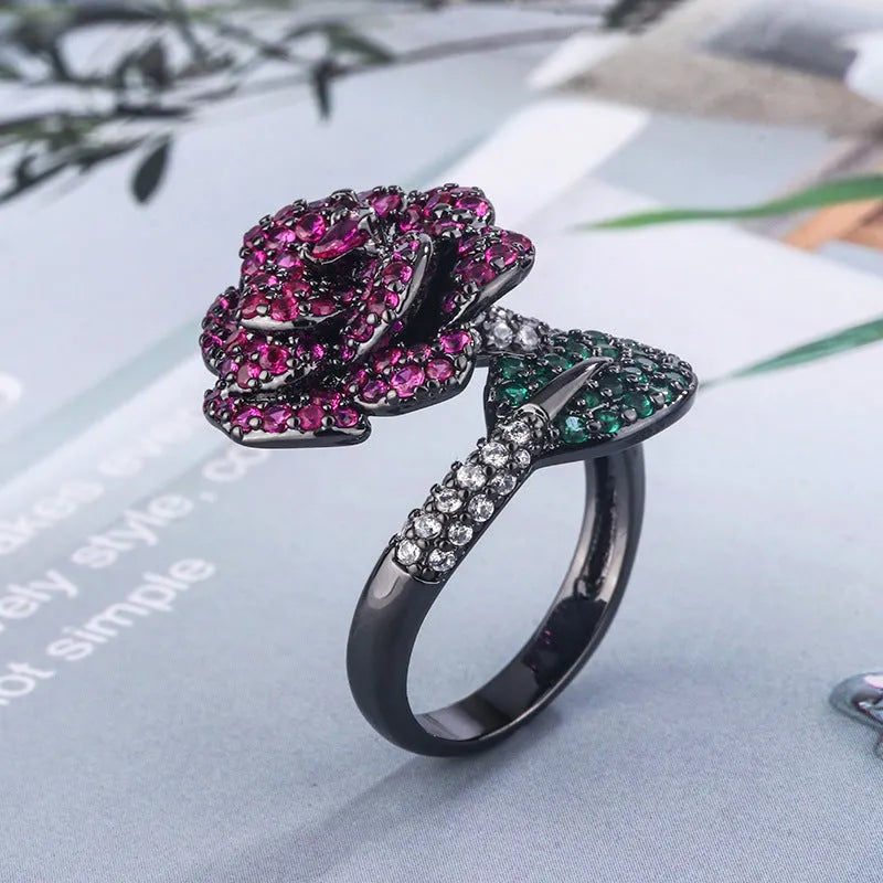 Geometric flower personality ring with gold-plated copper construction and red corundum centrepiece