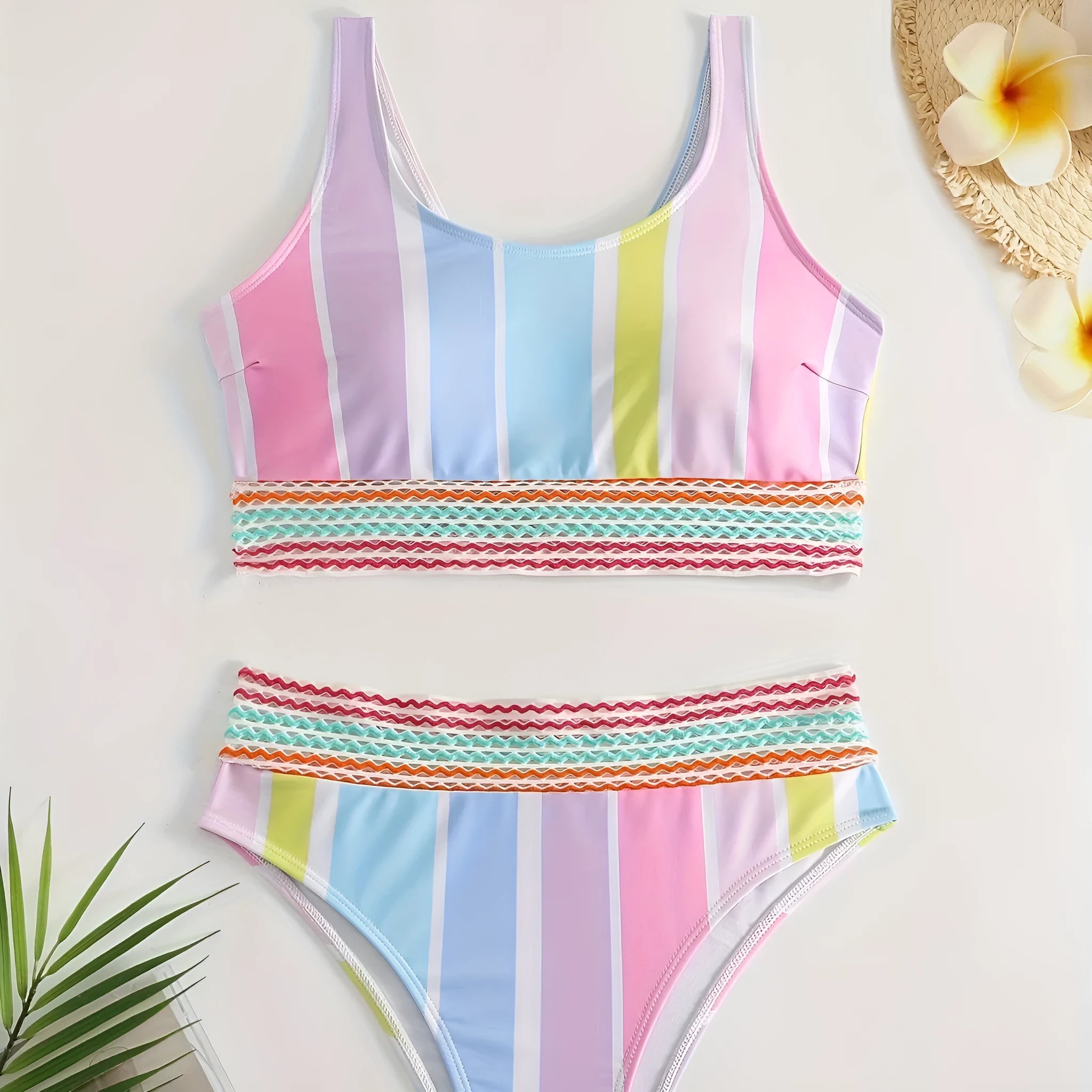 Women's striped bikini set in picture colour, showing top and briefs for swimming sports.