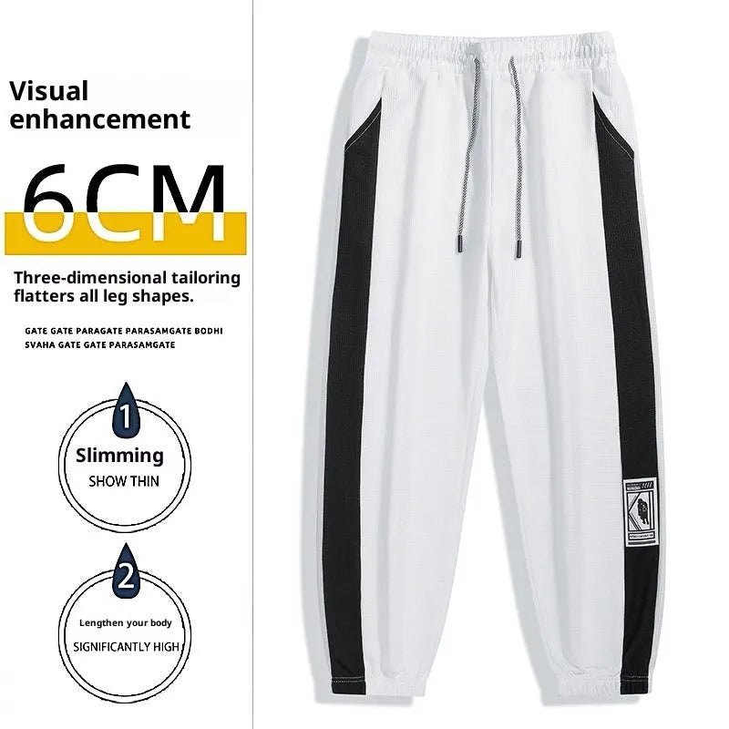 Men's casual wide leg fleece lined trousers in black, front view, showing drawstring waist and straight leg silhouette