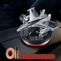Solar powered rotating aluminium alloy fighter jet shaped car air freshener ornament in silver colour